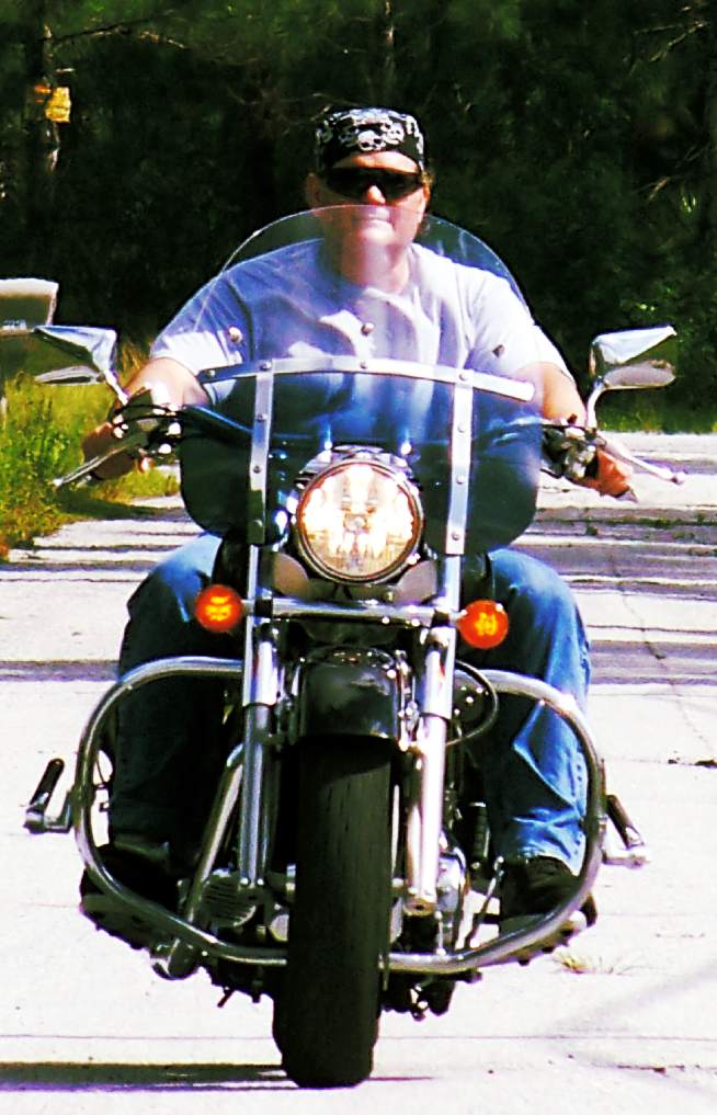 Florida writer books novellas short stories L. Davyd Pollack on motorcycle